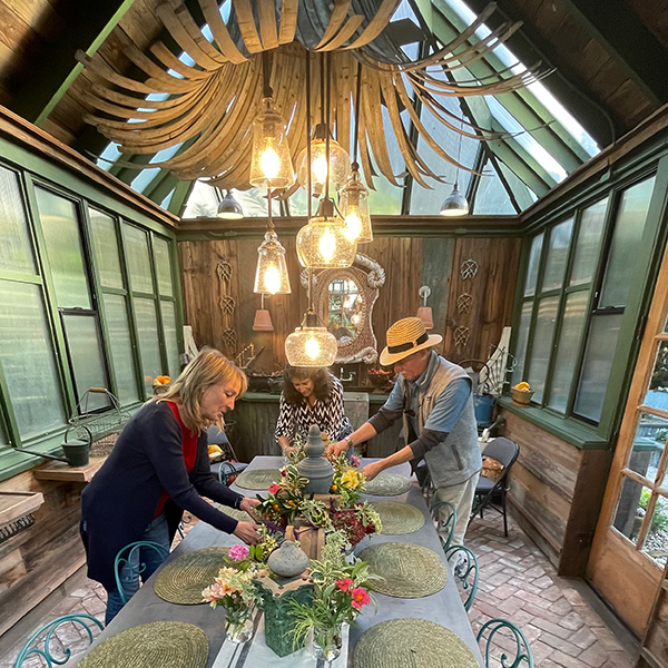 Preparation for guests to mingle and enjoy snacks in the greenhouse prior to classes.